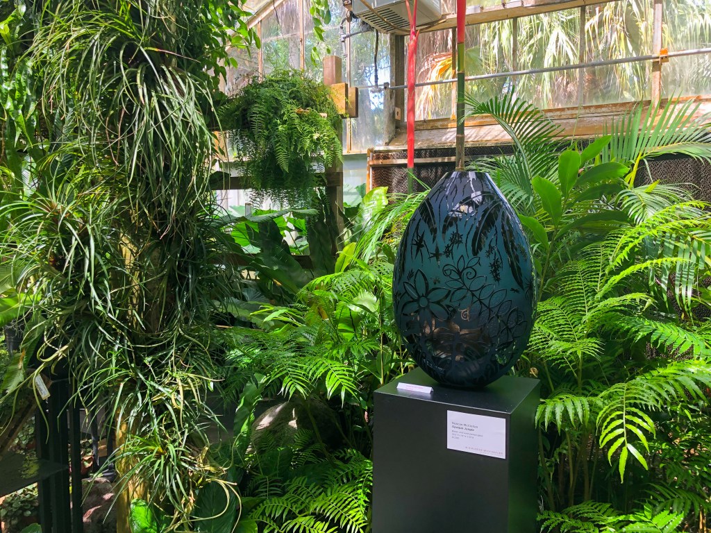 glass art piece inside green house at Marie Selby Botanical Garden